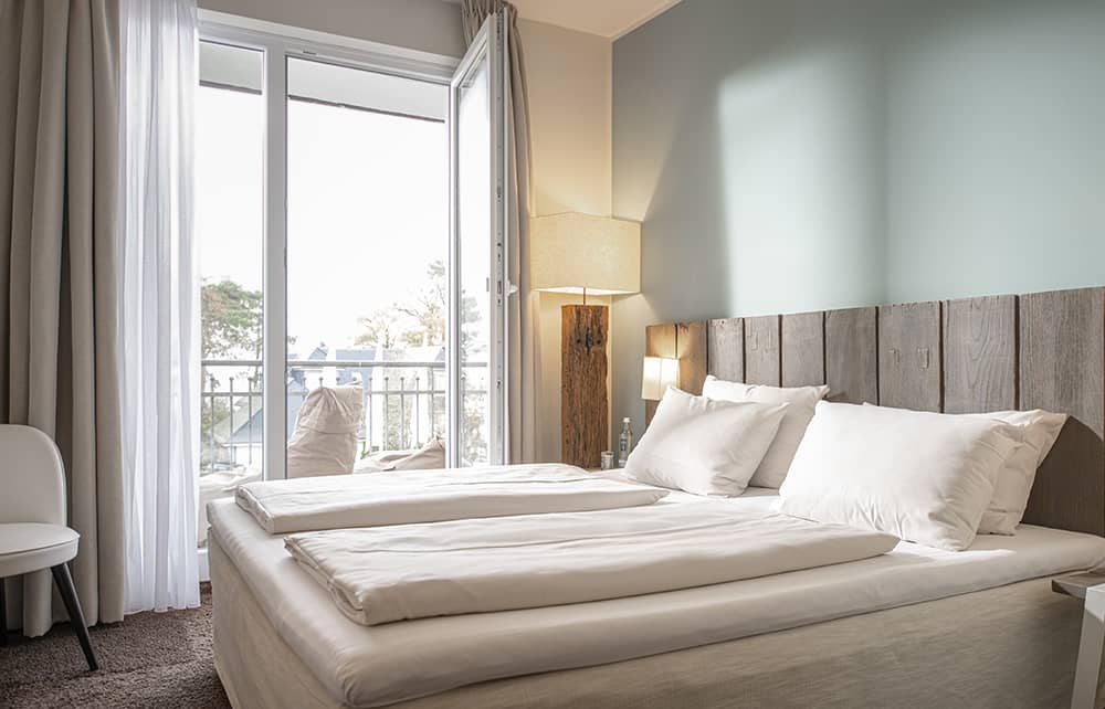 Coco-Mat bed in a Little Two + View room.