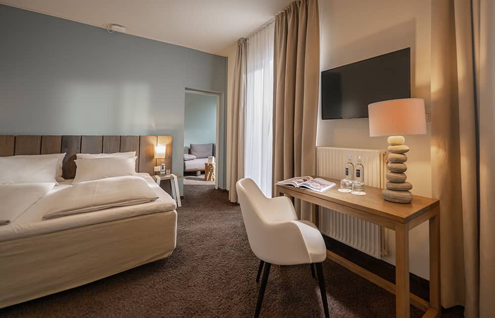 Room view of an And More Suite + room.